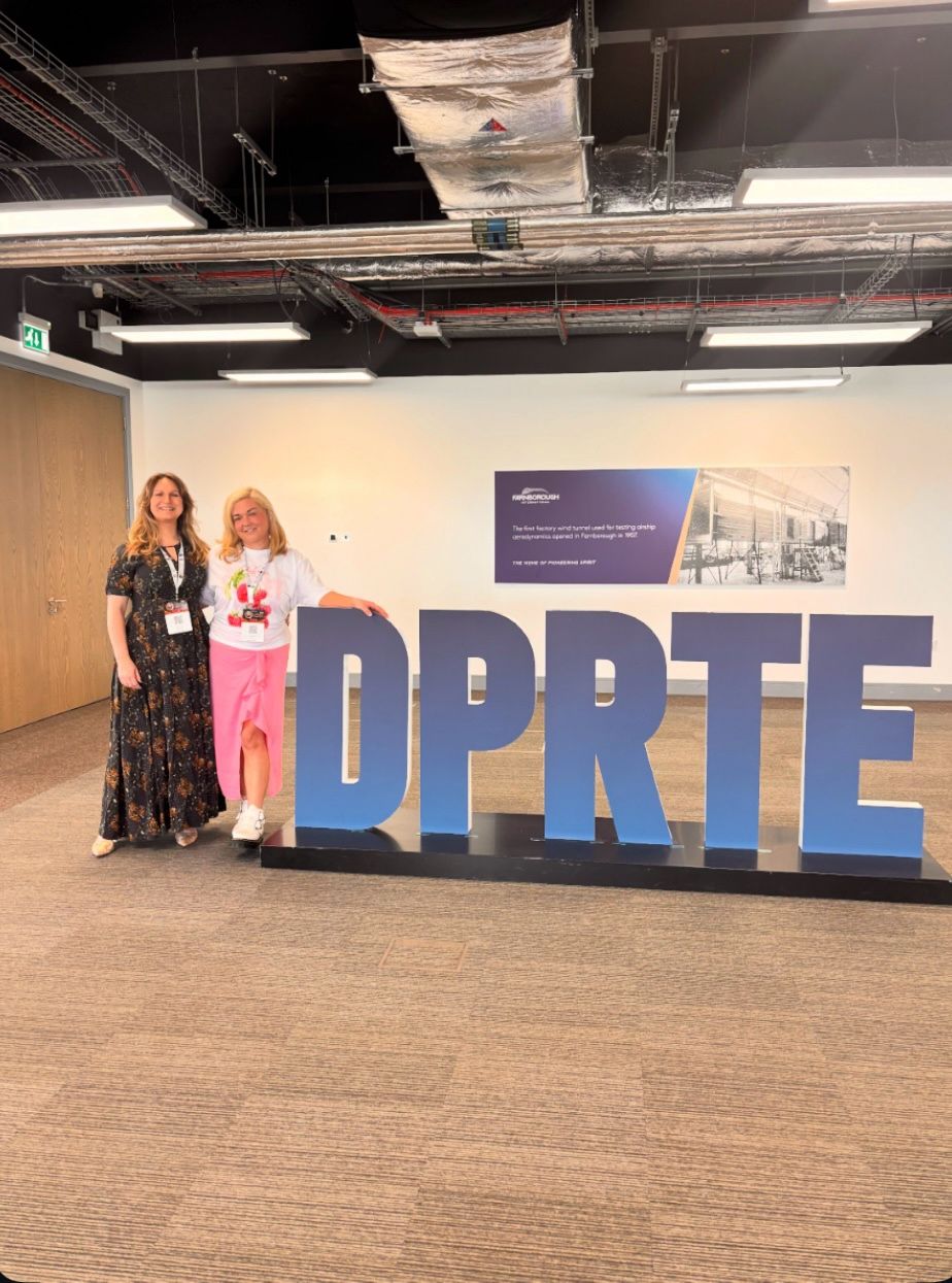 e50K team members attending DPRTE 2026 with support from Viking Arms Defence to promote defence social value and community resilience.